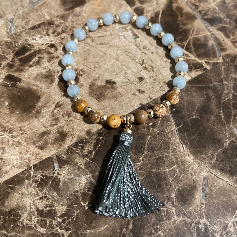 Browns and blue stretch bracelet with tassel